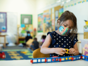 Young child using toys