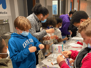 A group of students doing an experiment
