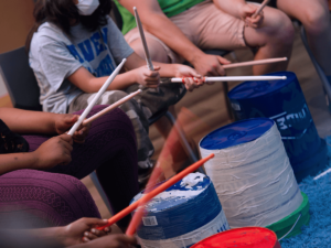Close up image of drumming circle
