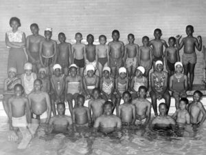 A group of Black youth swimmers.