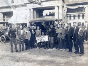 Men stnading outside an old YMCA in 1909.