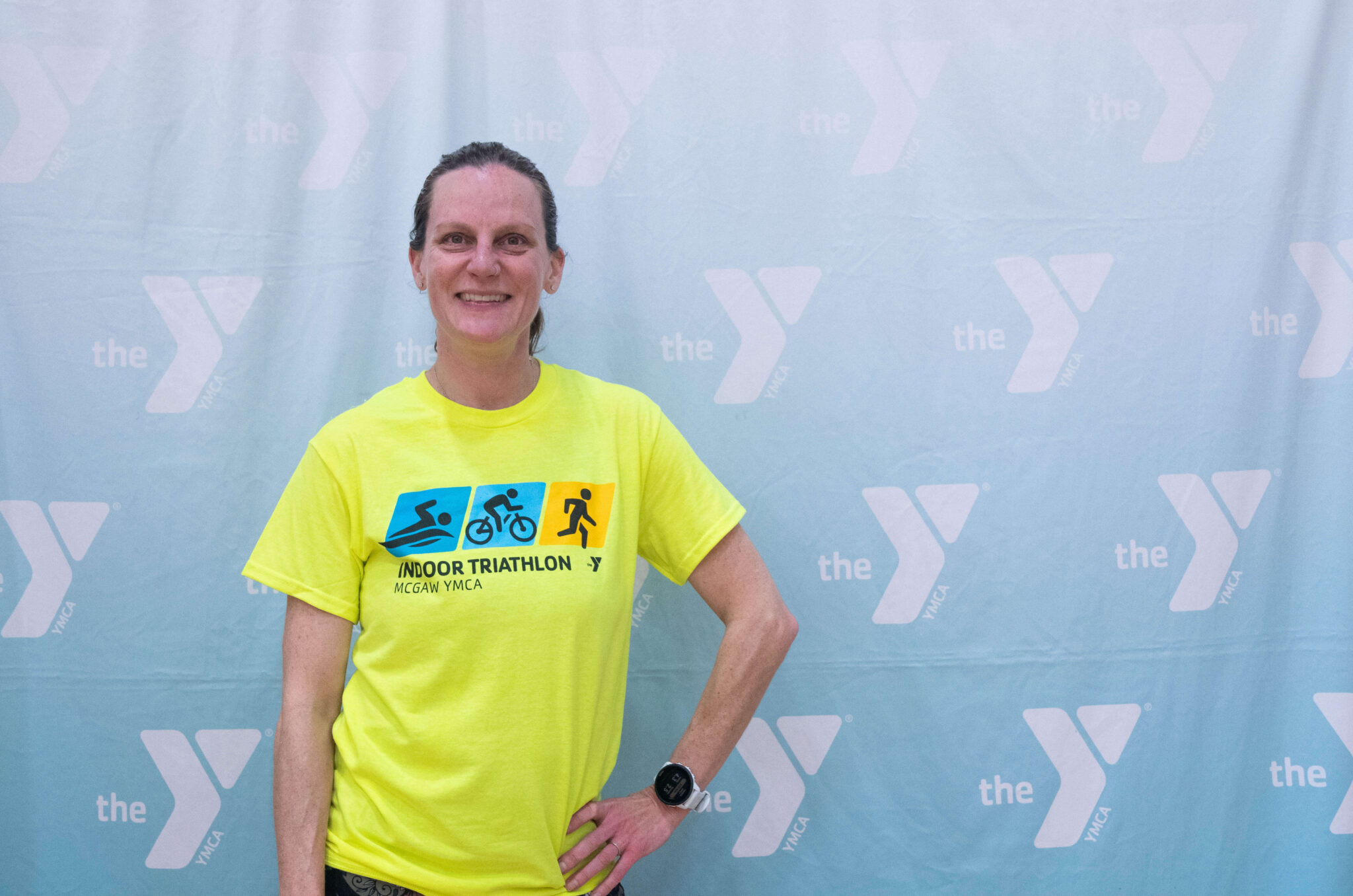 A person smiling after finishing the McGaw Y triathlon