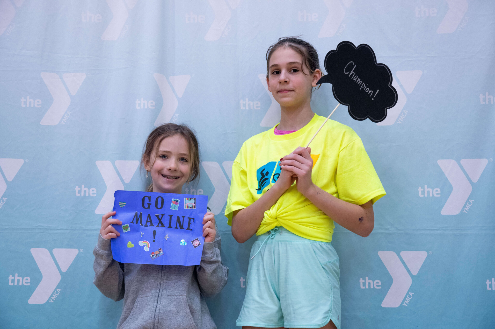 Two people smiling after finishing the McGaw Y triathlon