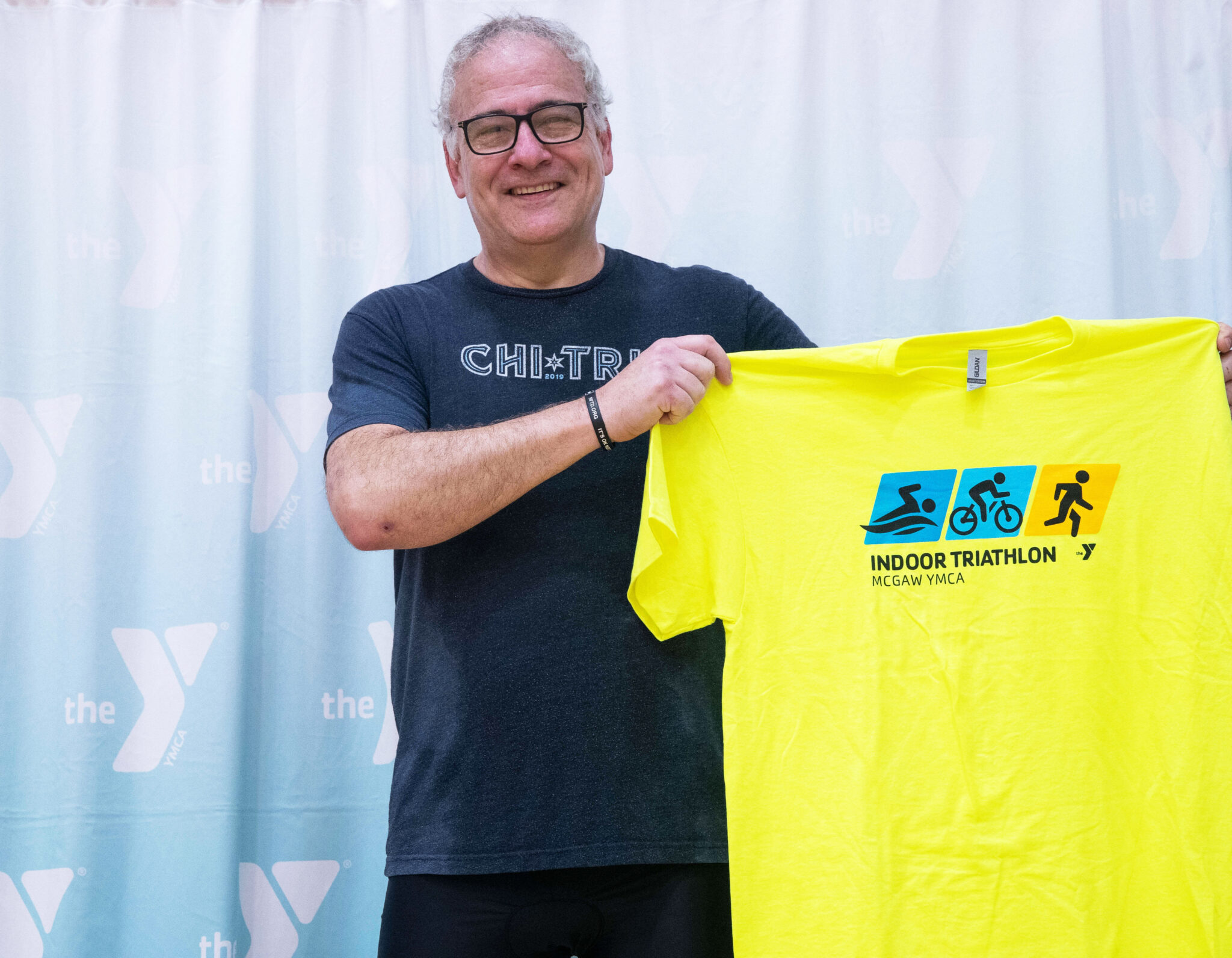 A person smiling after finishing the McGaw Y triathlon
