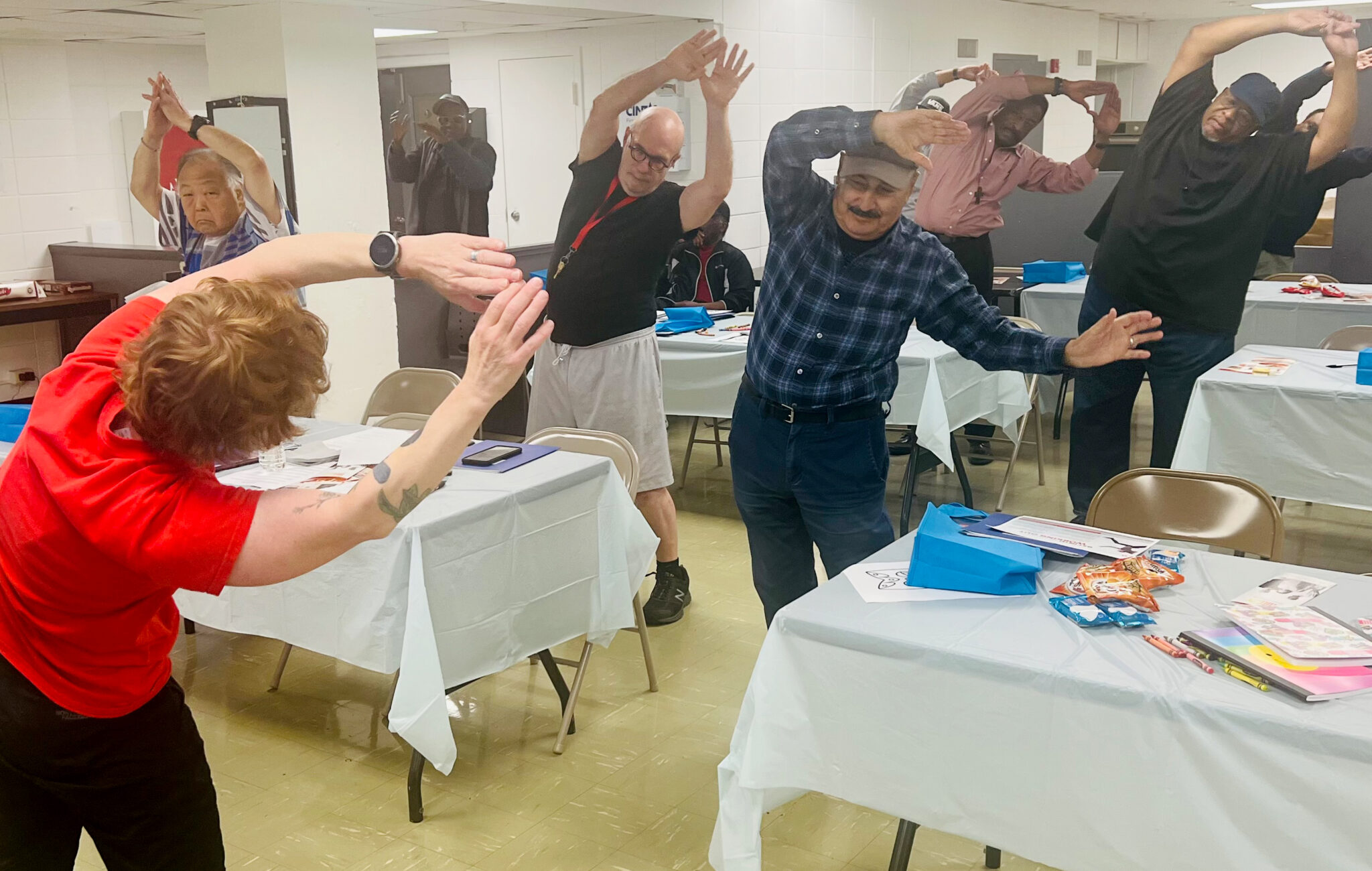 Resident men doing stretch exercises
