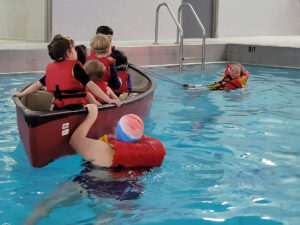 Summer Day Camp kids at McGaw YMCA getting water safety lessons.