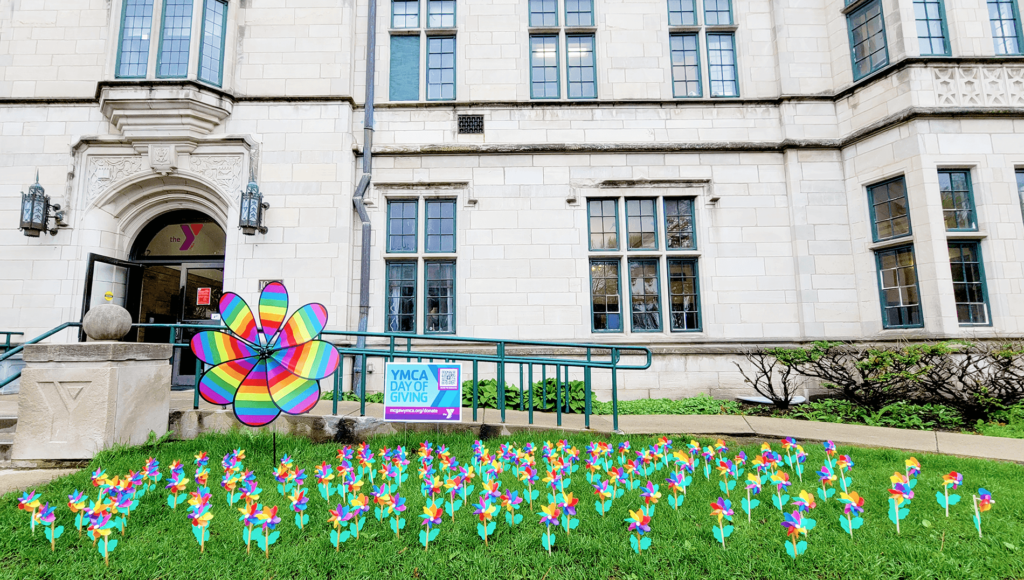 The front lawn of the YMCA with dozens of pinwheels