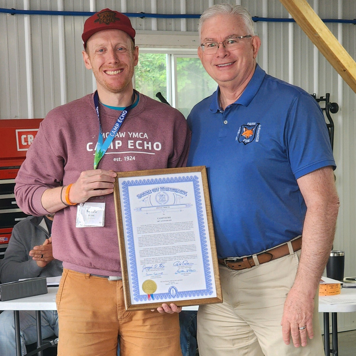 B. Rocca accepts tribute from Rep. Fox