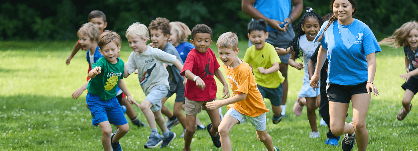 Summer camp kids playing outside.