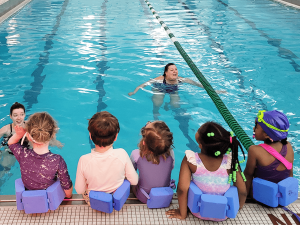 Children in YMCA swim lessons.